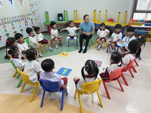 TEFL teacher leading a preschool class in Thailand